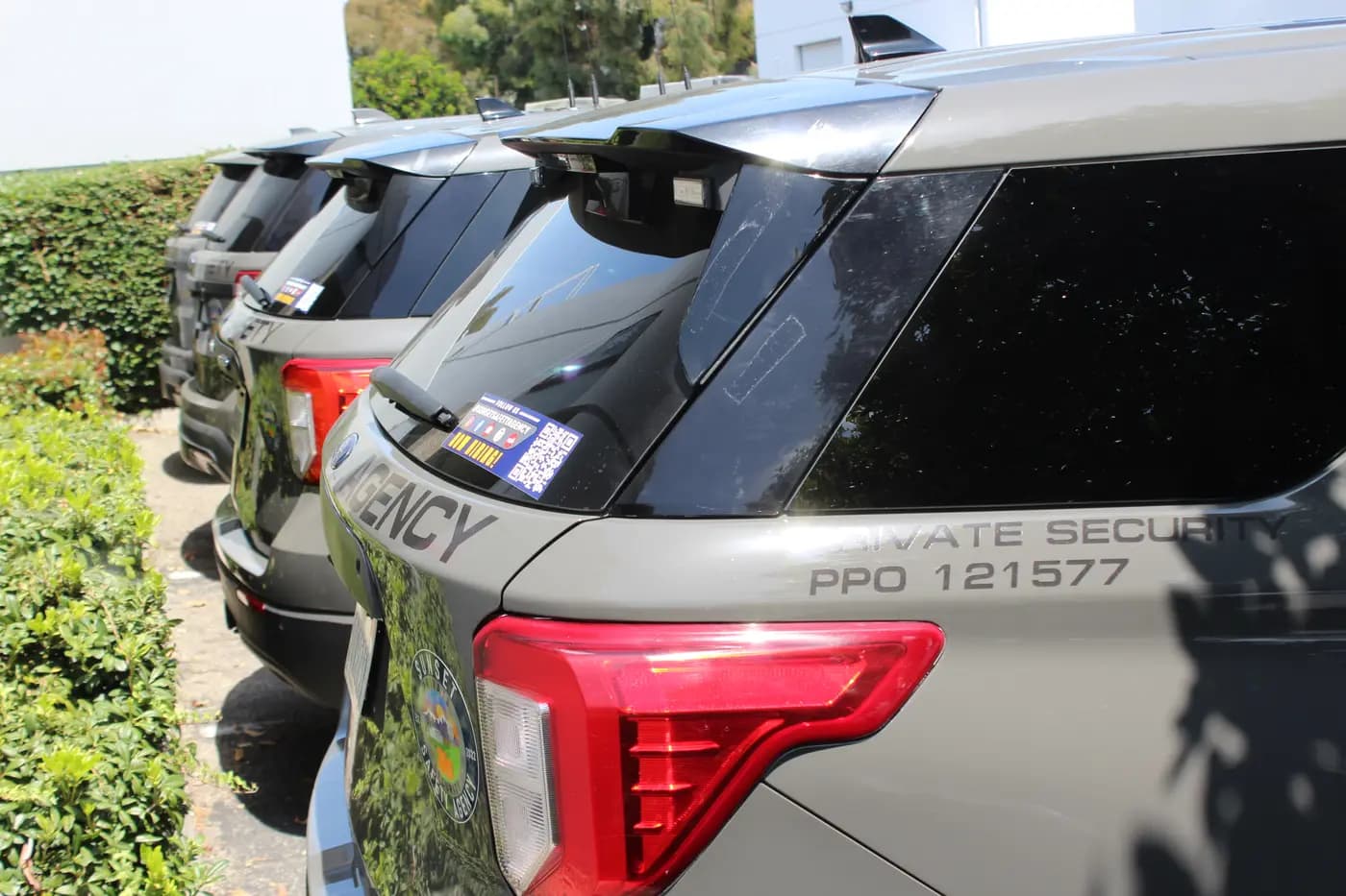 Patrol SUV liftgates with PPO 121577 lettering and a Now Hiring QR-code sticker