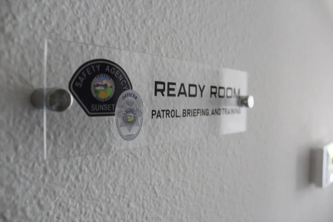 Ready Room door sign for patrol briefing and training at headquarters